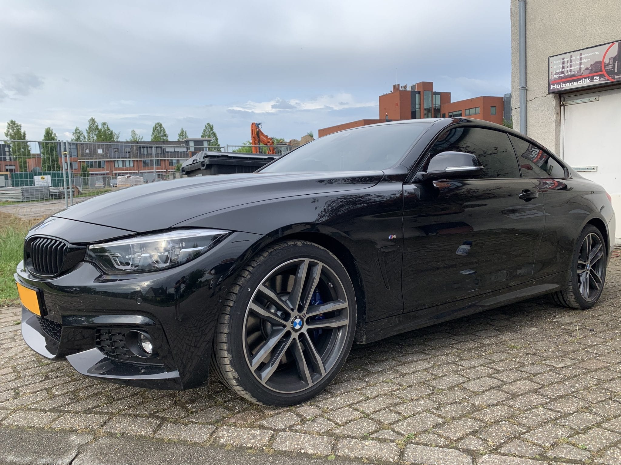 Zwarte Carwrap BMW | Trim-Line Zevenbergen
