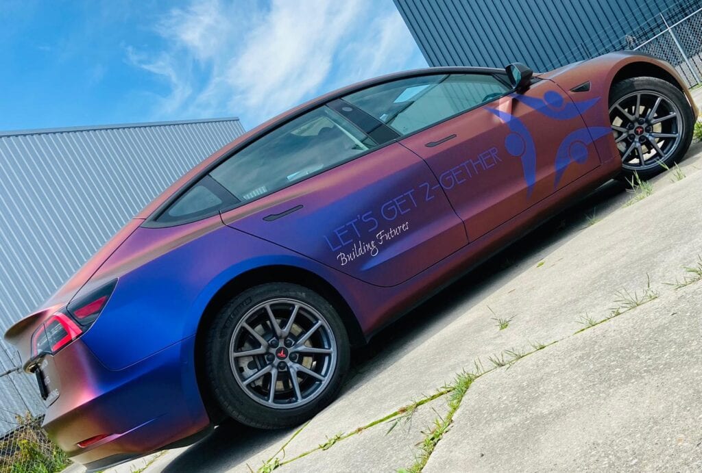 Let's get 2-gether - Tesla Car Wrapping - Zijkant | Trim-Line Zevenbergen